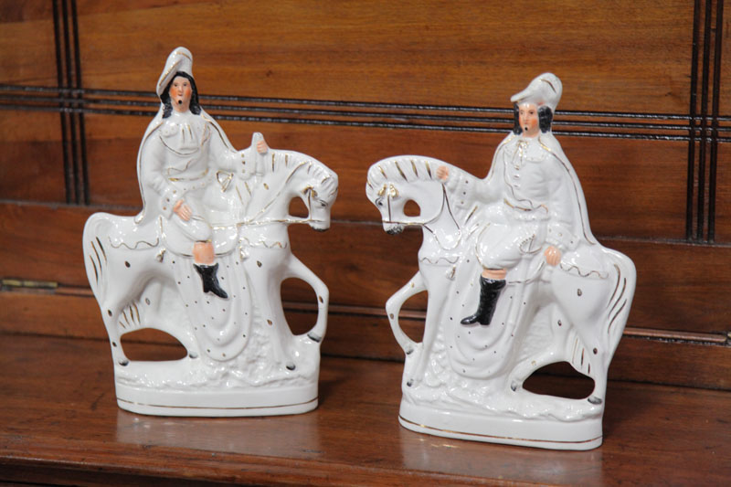 Appraisal: PAIR OF STAFFORDSHIRE FIGURAL PIECES Facing pair with gilt accents