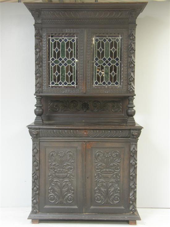 Appraisal: A th century Continental carved oak dresser the top section