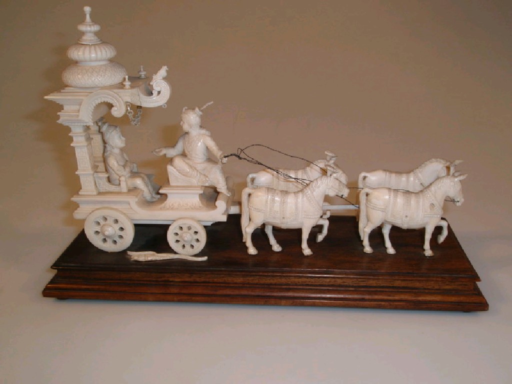 Appraisal: An Indian carved ivory group of a ceremonial horse drawn