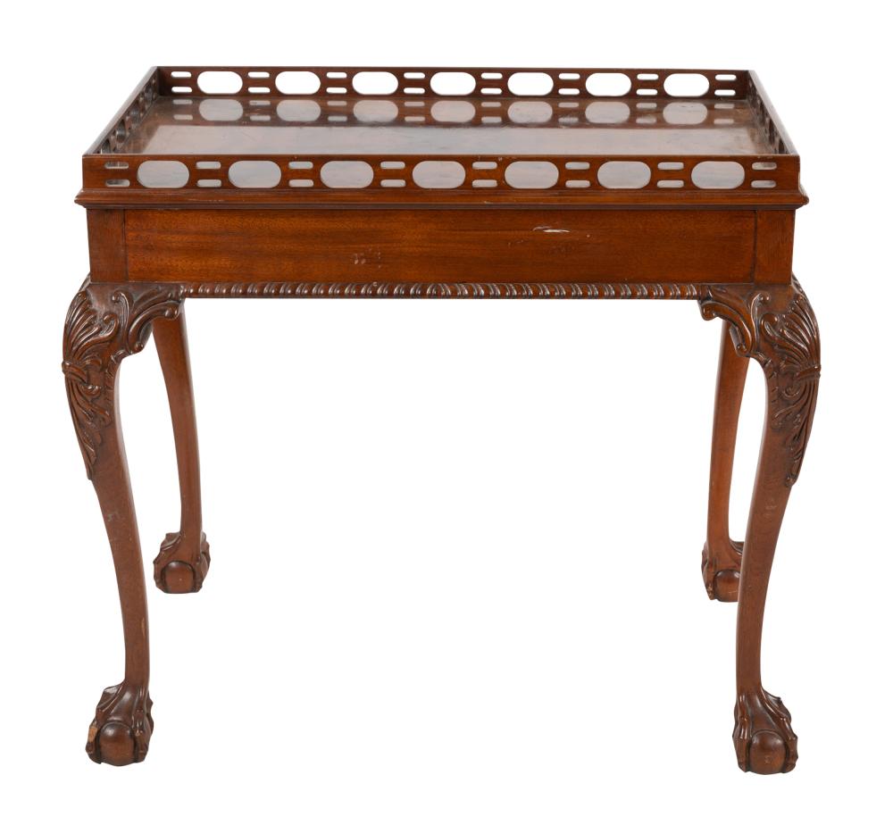 Appraisal: CHIPPENDALE-STYLE MAHOGANY OCCASIONAL TABLEmodern with pierced gallery and carved legs