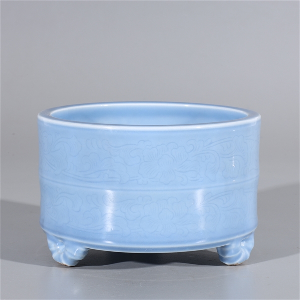 Appraisal: Chinese blue porcelain tripod censer with foliate designs and six-character