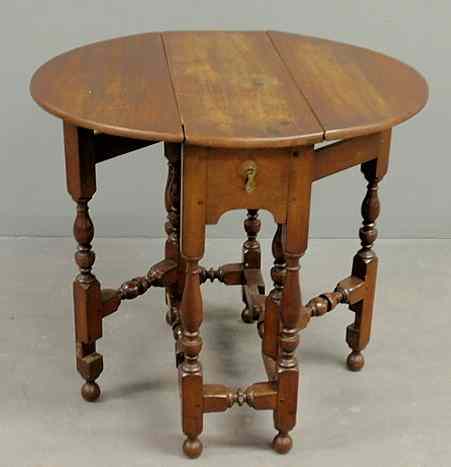 Appraisal: Diminutive William Mary style gate-leg table with D-shaped leaves single