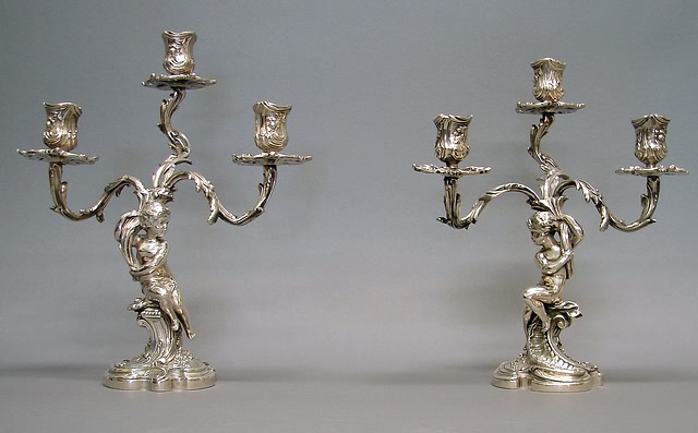 Appraisal: Molded sockets with leaf-ornamented drip pans male and female pedestals