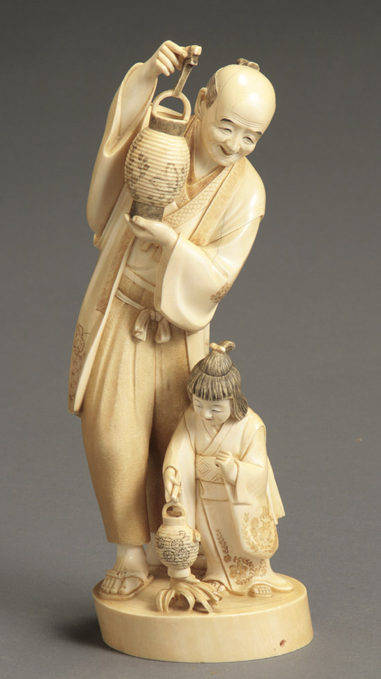 Appraisal: Japanese Partial Tea-Ivory Okimono of a Man with Child Holding