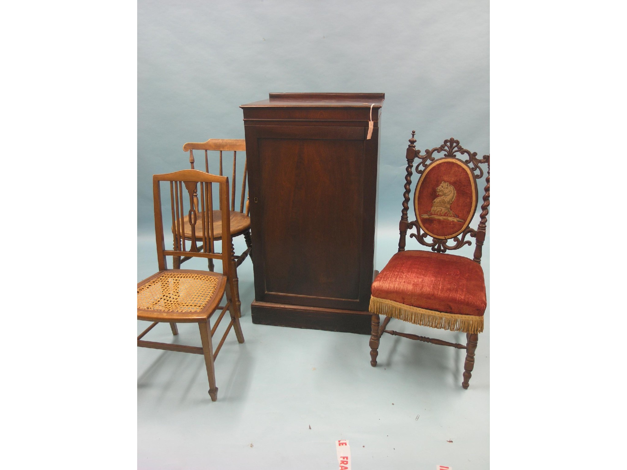 Appraisal: A Victorian mahogany cupboard enclosed by single panelled door ft