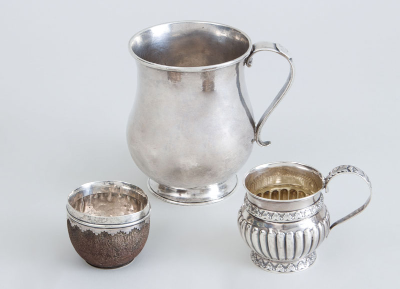 Appraisal: LATIN AMERICAN SILVER MUG A CRESTED SILVER-RIMMED COCONUT COP AND