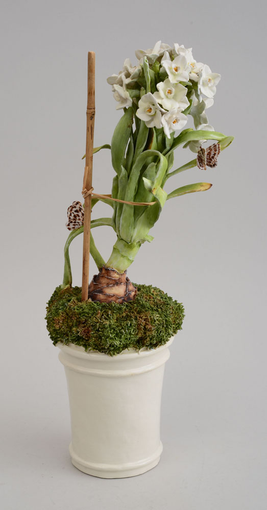 Appraisal: ENGLISH POTTERY TABLE DECORATION OF A POTTED HYACINTH WITH BUTTERFLIES