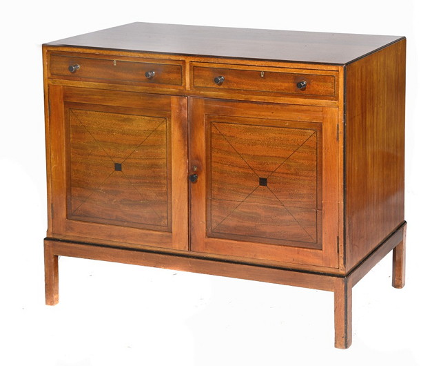 Appraisal: A HEALS WALNUT AND EBONISED SMALL SIDEBOARD with cupboard front