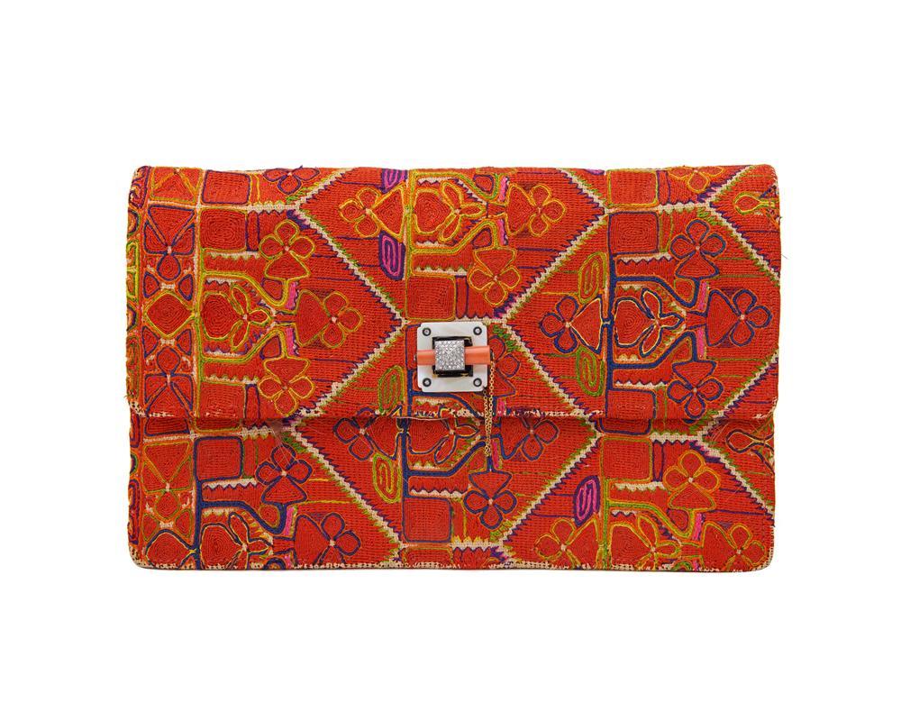 Appraisal: CARTIER Embroidered Clutch with a Mother of Pearl Diamond Coral