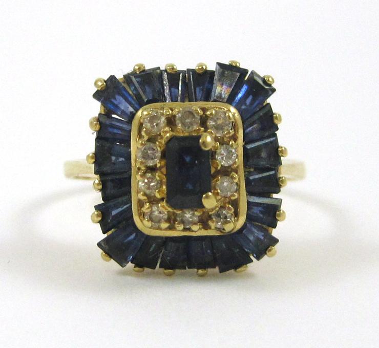 Appraisal: SAPPHIRE DIAMOND AND FOURTEEN KARAT GOLD RING with tapered baguette