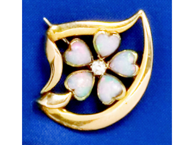 Appraisal: OPAL AND DIAMOND BROOCH k yellow gold brooch set with