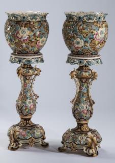 Appraisal: Continental majolica jardinieres w stands h Pair of Continental majolica