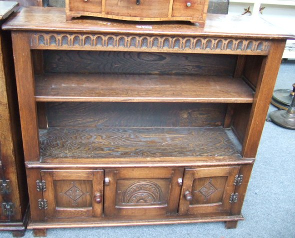 Appraisal: A th century oak floor standing bookcase the pair of