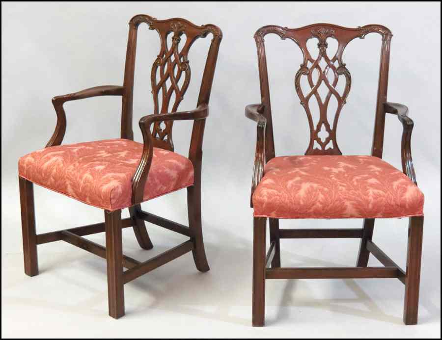 Appraisal: PAIR OF CHIPPENDALE STYLE CARVED MAHOGANY ARMCHAIRS Back height ''