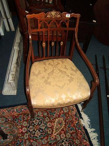 Appraisal: An Edwardian rosewood and inlaid occasional open armchair with overstuffed