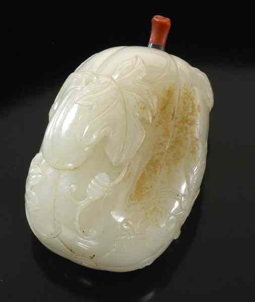 Appraisal: Chinese Qing carved white jade snuff bottledepicting pumpkins on a