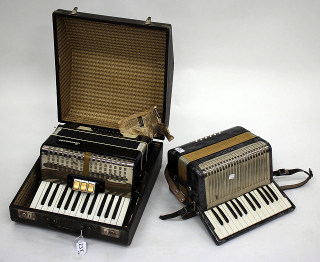 Appraisal: A BELL ACCORDION together with a Sorrento accordion