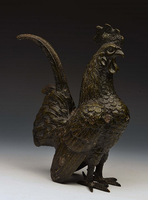 Appraisal: A BRONZE MODEL of a cockerel in alert stance cm