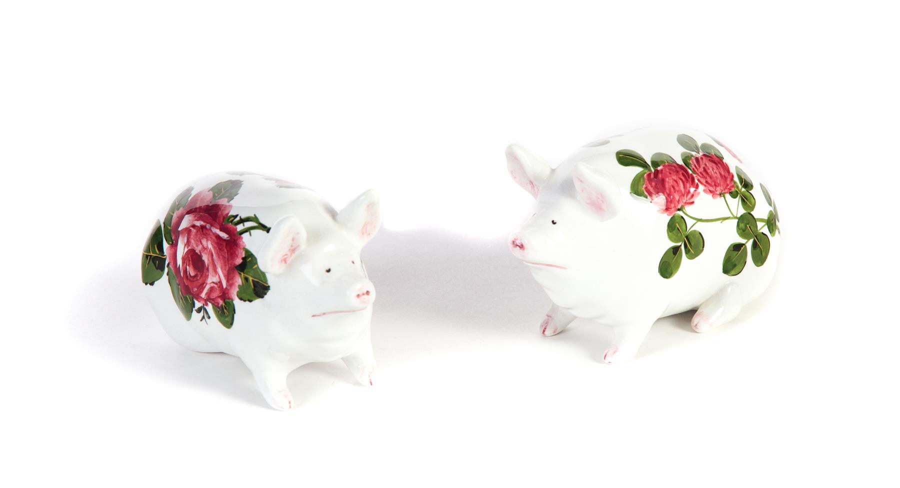 Appraisal: PAIR OF WEMYSS WARE SMALL PIGS England mid th century