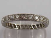 Appraisal: A white metal tests platinum diamond eternity ring estimated total