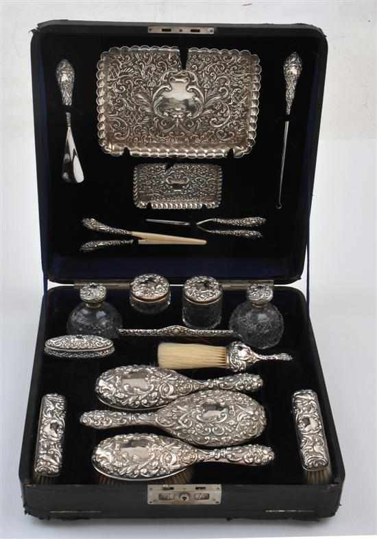 Appraisal: An Edwardian sterling silver vanity and dressing set Makers mark