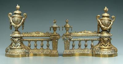 Appraisal: Pair brass chenet flame and urn finials lion and goat