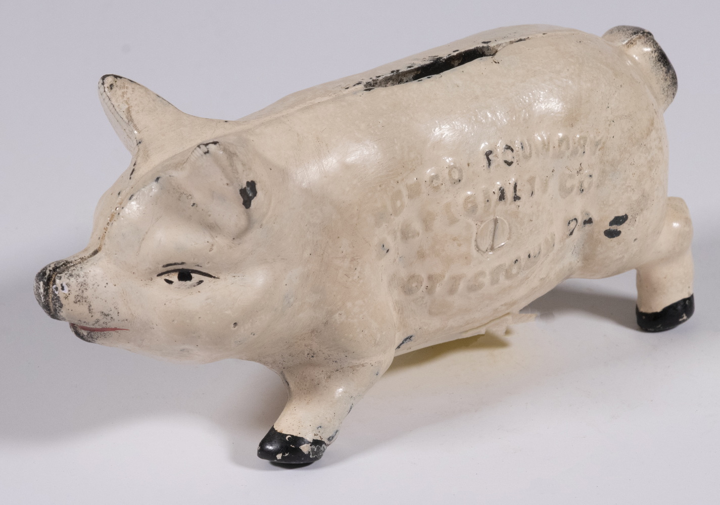 Appraisal: NORCO ADVERTISING PIG FORM IRON STILL BANK Vintage Cast Iron