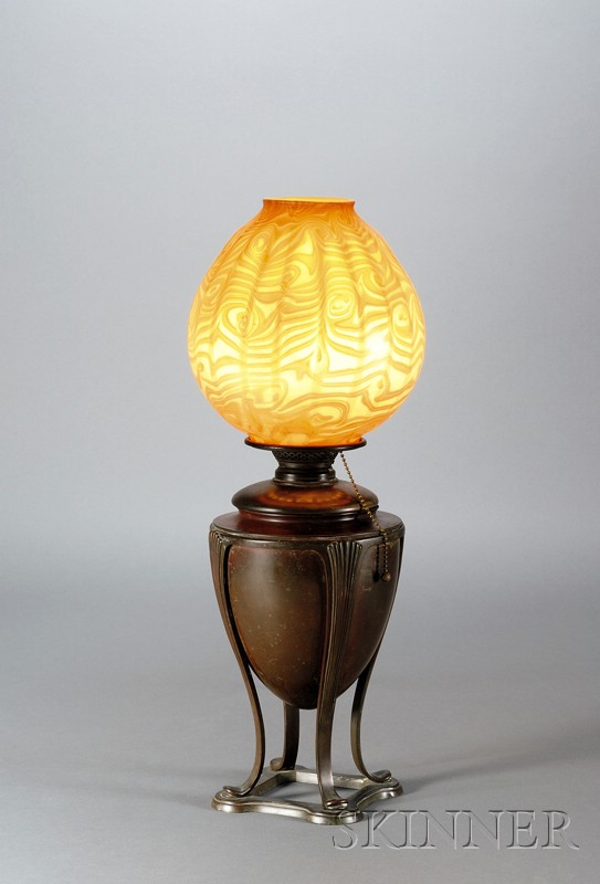 Appraisal: Early Tiffany Lamp Bronze and glass c The urn-form base