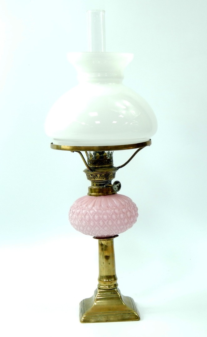 Appraisal: An early thC brass and pink opaline glass oil lamp