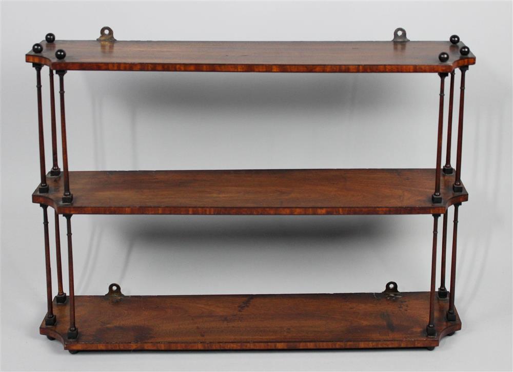 Appraisal: MAHOGANY THREE TIER HANGING WALL SHELF having three shaped shelves