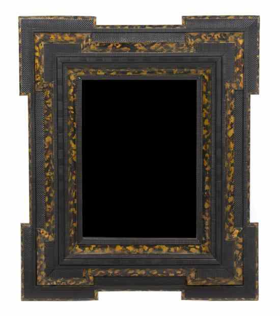 Appraisal: A Continental Ebonized and Faux Tortoise Shell Veneered Mirror of