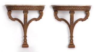 Appraisal: A pair of gilt and carved wood console tables Early