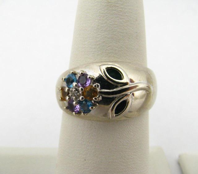 Appraisal: K white gold ring with multi-gemstone flower design size A