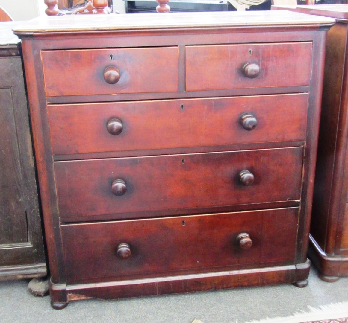 Appraisal: A Victorian mahogany chest of two short and three long