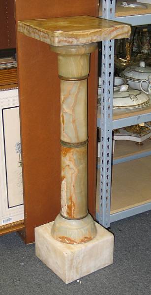 Appraisal: A Neoclassical style onyx pedestal early th century The cylindrical