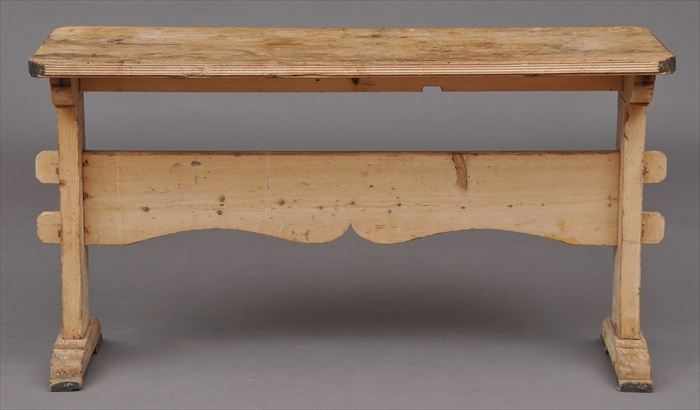 Appraisal: PINE TRESTLE TABLE The rectangular top with rounded corners over