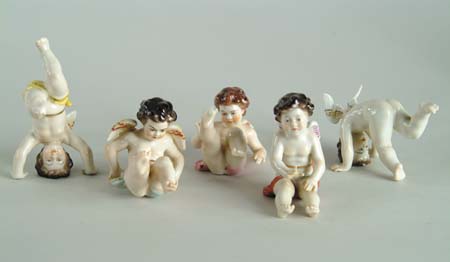 Appraisal: LOT OF FIVE CAPI DI MONTE CHERUB FIGURINES Each marked