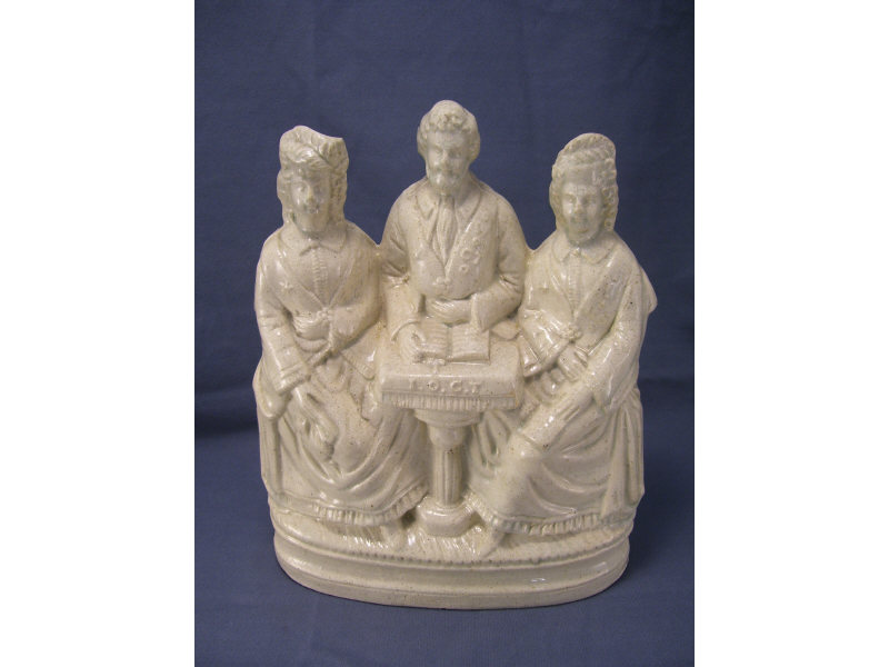 Appraisal: Staffordshire I O G T Figural Group Unpainted stoneware figure