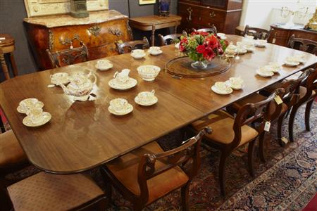 Appraisal: GOOD REGENCY STYLE MAHOGANY TRIPLE PILLAR DINING TABLE ATTRIBUTED TO