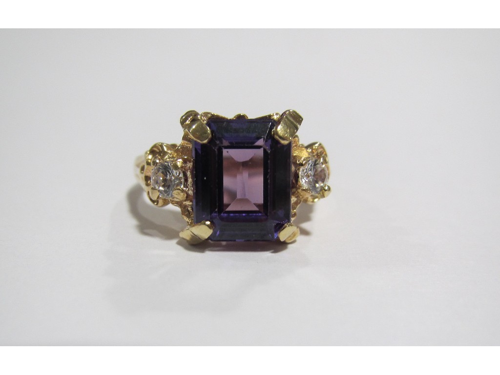 Appraisal: A fourteen carat gold alexandrite and diamond three stone ring