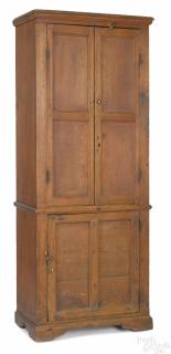 Appraisal: Southern hard pine cupboard ca with recessed panel doors and