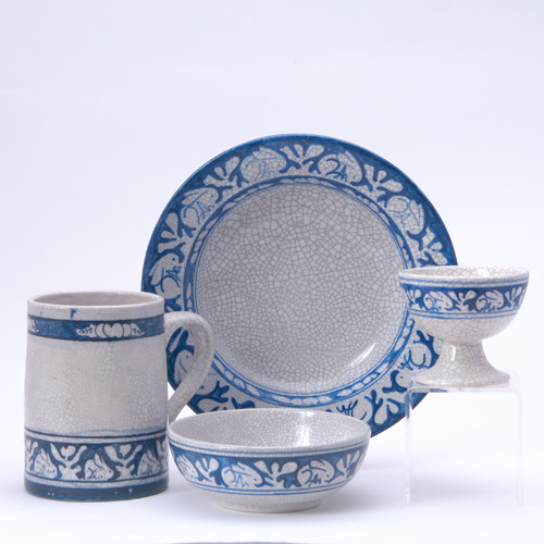 Appraisal: DEDHAM Four Crackleware pieces in the Clockwise Rabbit pattern a