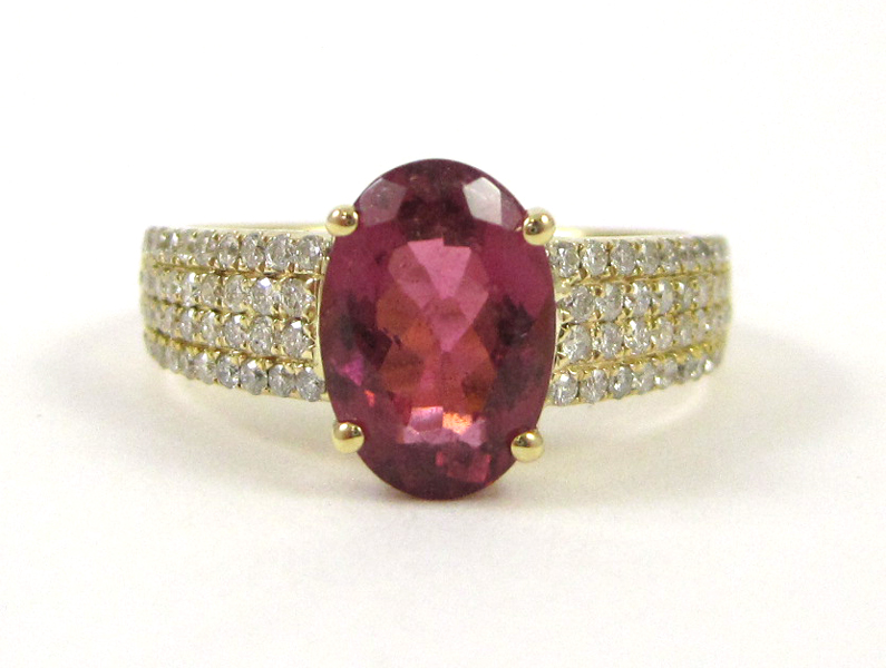 Appraisal: PINK TOURMALINE AND DIAMOND RING The k yellow gold ring