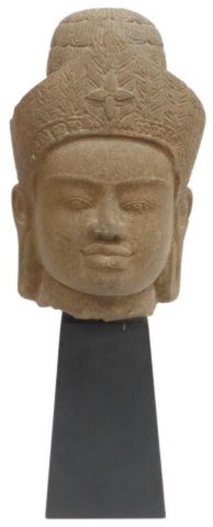 Appraisal: Carved stone sculpture Head of a Deity in the style