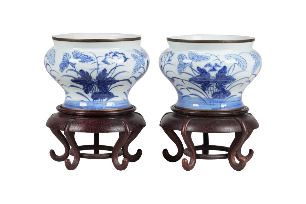 Appraisal: PAIR OF CHINESE BLUE WHITE PORCELAIN CACHEPOTSwith copper lining to