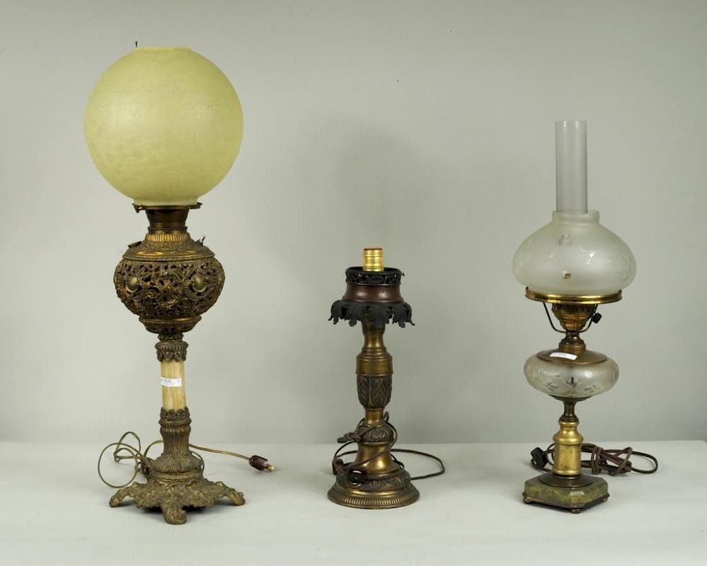 Appraisal: Three Victorian Converted Metal Table Lamps Three Victorian converted metal