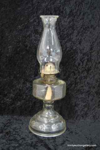 Appraisal: Vintage Clear Pressed Glass Oil LampFrom the estate is a