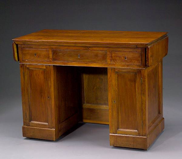 Appraisal: An Italian Neoclassical walnut desk last quarter th century height