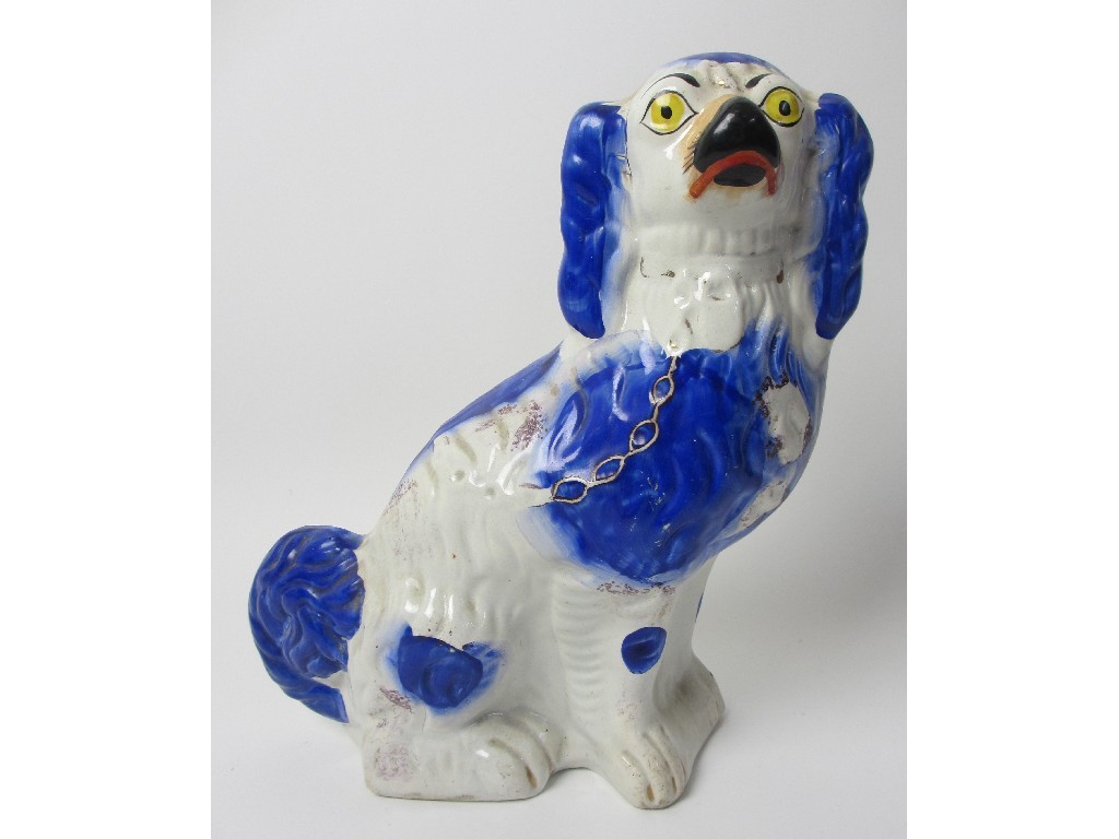 Appraisal: An Alloa Pottery model of a Spaniel with blue markings