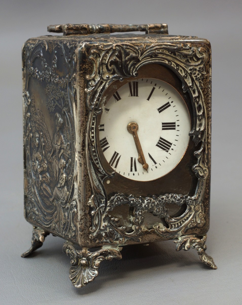 Appraisal: French carriage clock contained in an English silver case lady